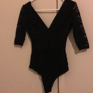 Black blouse size small but it looks like XS